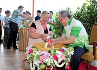 Chatchawal Supachayanont, GM of Dusit Thani Pattaya receives greetings and good wishes from families, staff and guests at lustral water pouring and blessing ceremonies held to mark Songkran, the Thai New Year on April 13.